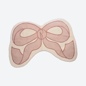 Rachel Zoe pink bow accent rug